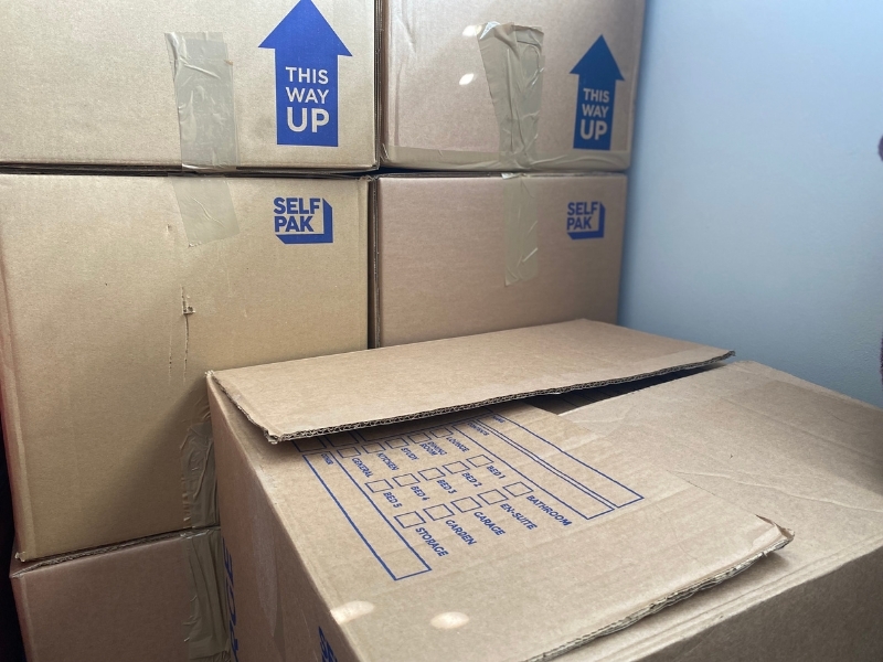 cardboard-boxes-stacked-up-for-a-removal