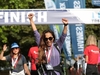 participant-cheers-as-she-crosses-the-thames-bridges-trek-finish-line