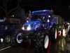 a-blue-tractor-covered-in-christmas-lights