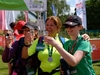 three-participants-cheers-a-glass-of-fizz-at-the-lake-district-ultra-callenge-finish-line