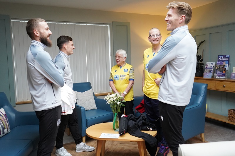 stevenage-fc-players-stand-and-talk-to-supporters-vivien-and-derek