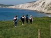 hikers-trekking-in-front-of-views-of-cliffs-and-sea-at-the-isle-of-wight-ultra-challenge