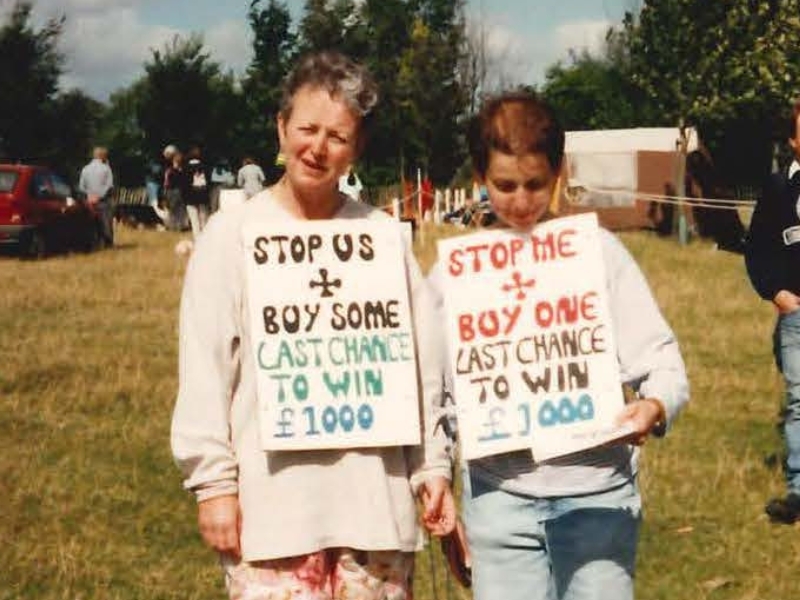 former-hospice-matron-trudy-and-kathryn-wearing-handmade-sandwich-boards