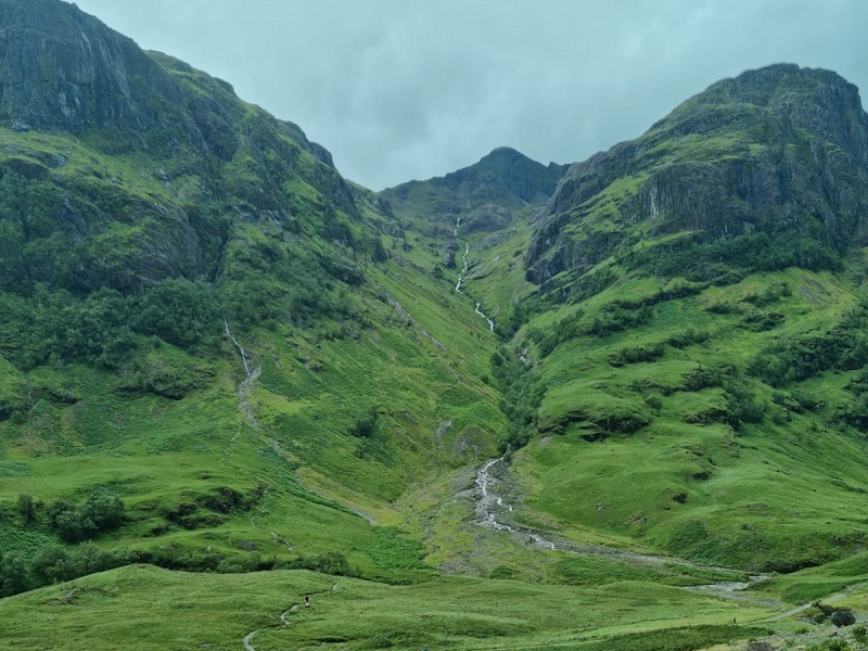 a-path-leading-up-a-mountain-taken-from-the-roadside