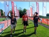 participants-wave-and-cheer-as-they-cross-the-lake-district-ultra-challenge-finish-line