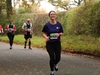 woman-running-herts-10k-smiles-at-camera