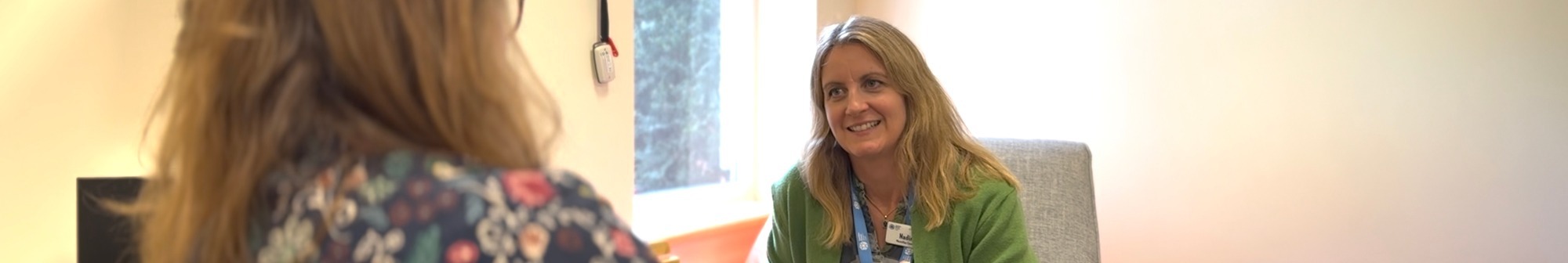 counsellor-nadine-smiling-while-talking-to-a-service-user