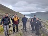 national-three-peaks-challenge-team-smile-as-they-climb-mountain