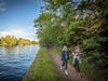 participants-walk-alongside-the-river-on-the-thames-path-ultra-challenge