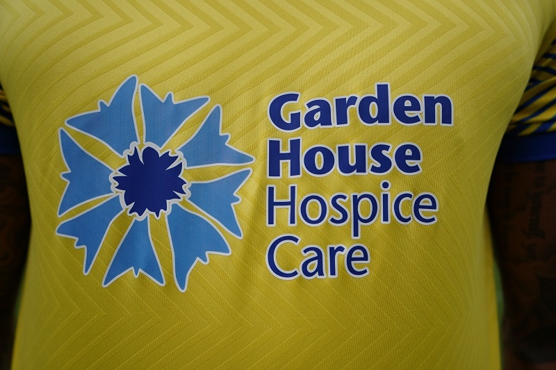 close-up-of-hospice-logo-on-third-team-kit-jersey