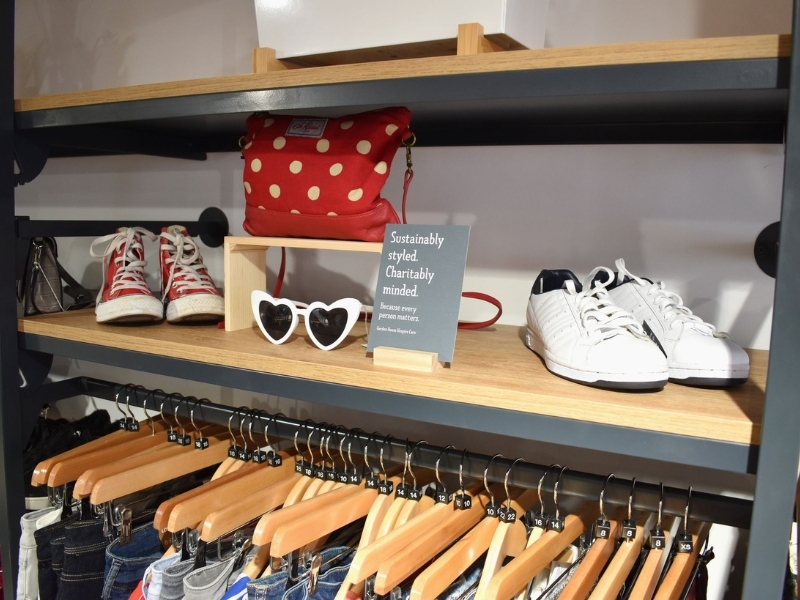 shoes-sunglasses-and-a-handbag-on-a-shelf-in-our-baldock-shop