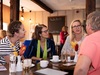 connect-members-and-guests-sit-around-a-table-talking