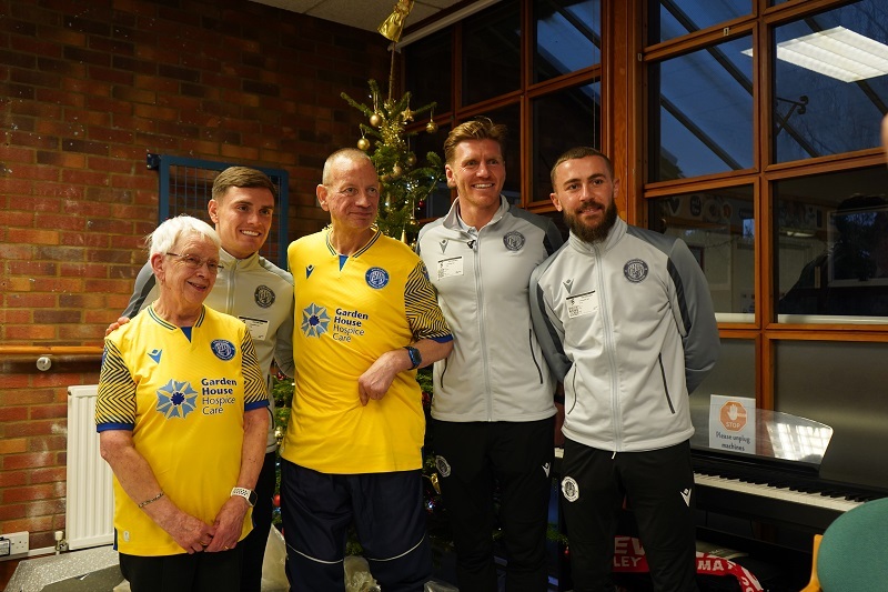 vivien-and-derek-wearing-third-kit-shirts-with-three-stevenage-fc-players