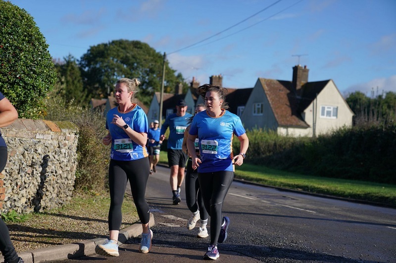 two-women-running-in-team-garden-house-t-shirts