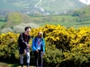 two-walkers-laugh-with-eachother-as-they-take-on-the-lake-district-ultra-challenge