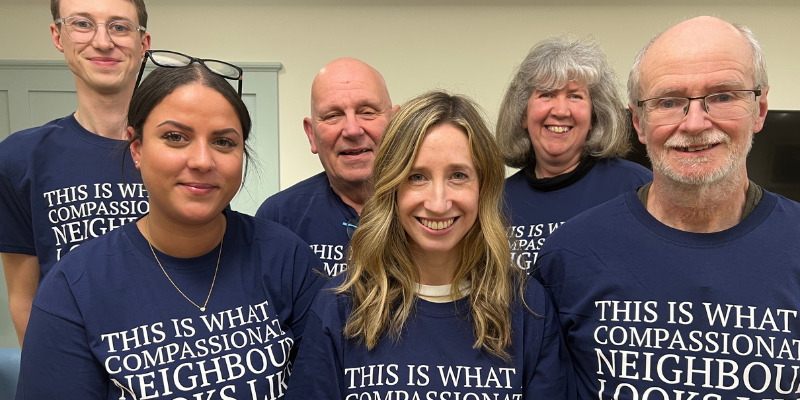 a-group-of-compassionate-neighbours-wearing-t-shirts-that-say-this-is-what-a-compassionate-neighbour