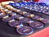 medals-laid-out-on-a-table-at-the-isle-of-wight-ultra-challenge